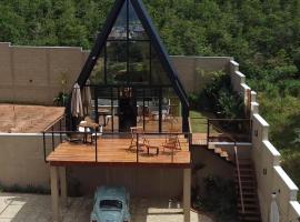 Chale Jardim Secreto、Andradasのホテル