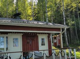 Saunamökki järven rannalla, Hotel in Säkäniemi