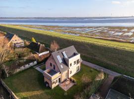 Deichkoje12 Deck 1 EG direkt am Eiderdeich nur 7 km bis zur Nordsee und 20 Min bis Sankt Peter Ording, hotell i Tönning