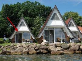 Ferienhaus Seeperle 11 mit Ruderboot - ABC211, hotel i Bad Kleinen