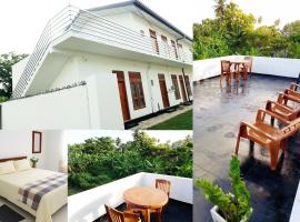 Tropical Suites - Airport Transit Residence, hostal en Negombo