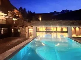 Aparthotel Familiaris - Family Apartments - Pools & Spa in Dolomites