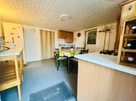 Studio e rez de jardin