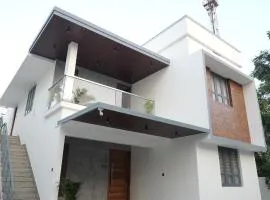 Siddhu's Nest - Near to Lulu mall, Kochuveli Railway station and KIMS Hospital