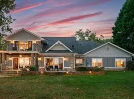 Lake Norman Lakefront w Private Beach Dock Hot Tub Fire Pit Sandy Shore by AvantStay