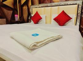 Hotel O Green Land Guest House, hotel em Tibri