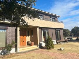 Kujukuri Green Garden Villa - 九十九里 グリーンガーデン -, hotel em Yokoshibahikari