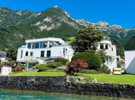 Exclusive Lake Access Villa Studio, hotel em Fluelen