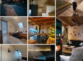 Chwilo Trwaj dom z jacuzzi, sauną i kominkiem z widokiem na góry Korbielów Pilsko，克比耶魯的飯店