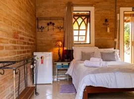 Birds Hospedagem - lareira e café da manhã