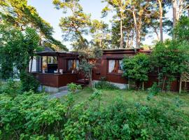 Ferienhaus am Strand 92, готель у місті Бабе