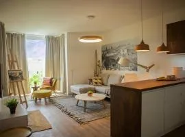 Priestranný dizajnový 2-izbový byt v centre Trnavy s výhľadom na mestskú vežue