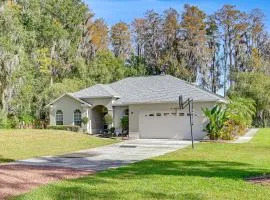 Dock, Lanai and Pool! Modern Red Bug Lake Retreat