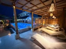 Signature Cecilia Garden Resort, хотел в Daanbantayan