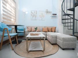 Woodlands Condotel، مكان إقامة مع الخدمة الذاتية لإعداد الطعام في Bulan