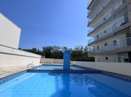 Lazer total, Churrasco, piscina e praia a poucos metros, Hotel in Bertioga