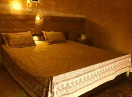 Kala Kutir Mud Stay near Taj Mahal King sized bed
