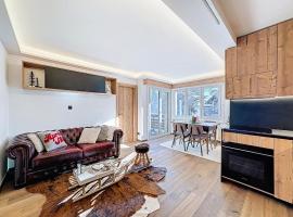 From green to slopes - Alpine ski and golf condo, hôtel à Crans-Montana