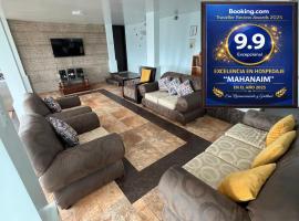 Espectacular Hermosa Casa Vacacional !Sorprendente vista del paisaje de toda la ciudad y sus alrededores!, hotel en Ambato