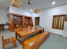 AANMEEZ Homestay, hotel a Kūttuparamba