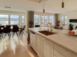 Swedish Timber House Overlooking Lake Arresø