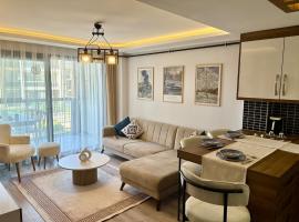 Theos Holiday Apartment Room 8, hotel a Kuşadası