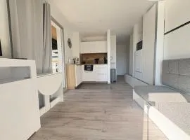 Appartement idéalement situé entre port et plage