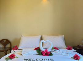 White Sand Inn, hotel em Maamigili