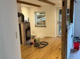 Unter den Balken - Helle Landhauswohnung mit Ofen & Ruhe