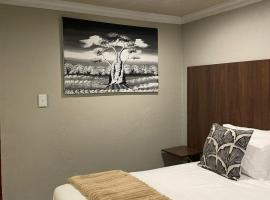 Village Walk Guesthouse, hotel i Kgabalatsane