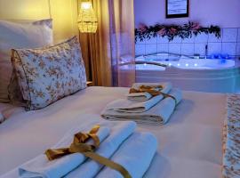 L'instant Beaujolais 2 ou 4 personnes Logis cosy balnéo vue jardin, Hotel in Theizé