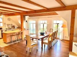 Ferienhaus Rügenbrise mit 5 Bädern, Steg und Boot