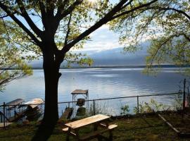 Anthony Beach - Seneca Lakefront Retreat w Covered Dock Lounge Area - Hot Tub & Fire Pit - Pets OK, Hotel in Penn Yan