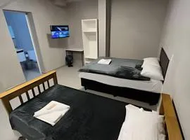 #115 Suíte cama casal e solteiro c/ vaga - Centro