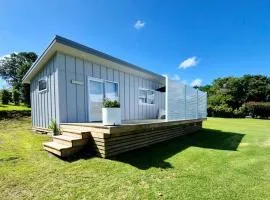 The NEST New Boutique Tiny home Inlet Water Views