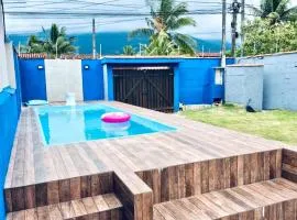 Casa com Piscina em Caraguatatuba