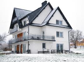 Apartamenty w sadzie, hotel em Przenosza