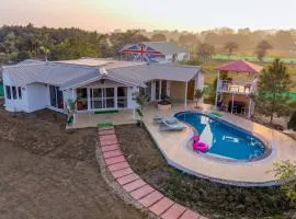 ELIVAAS Vedaaz Farms Pet-friendly 4-BHK Villa With Private Outdoor Pool and Garden area