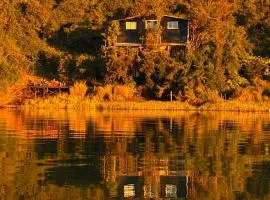 Cabaña con vista al mar frente al humedal,Casa Mareal
