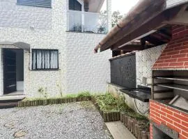 SlimHaus pé na AREIA