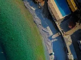 Lalloudes Seaside Suites Sea and Pool View