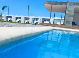 Casa Familiar a Pasos del Mar Playa y Felicidad