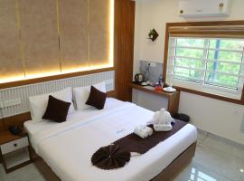 Cloud9 Airport Hotel, отель в городе Недумбассери