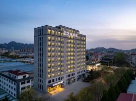 ELONG Hotel Qingdao West Coast & World Expo City, hotel din Qingdao