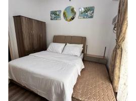 Amani Grand Resort Residences Near Mactan Airport, hotel a Pusok