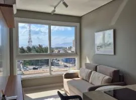 Apartamento com 1 suíte, sofá cama na sala e lavabo