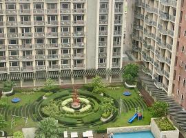 Condo Monarch Parksuites, acomoda&ccedil;&atilde;o em condom&iacute;nio em Sampong