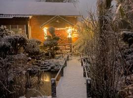 Charmante Fachwerkhaushälfte mit Sauna, hotel en Rosche