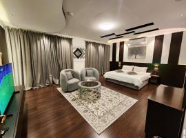 جناح فاخر بوصول ذاتي وفناء مطل, Hotel in Ta'if