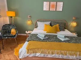 Mustard-colored apartment for two